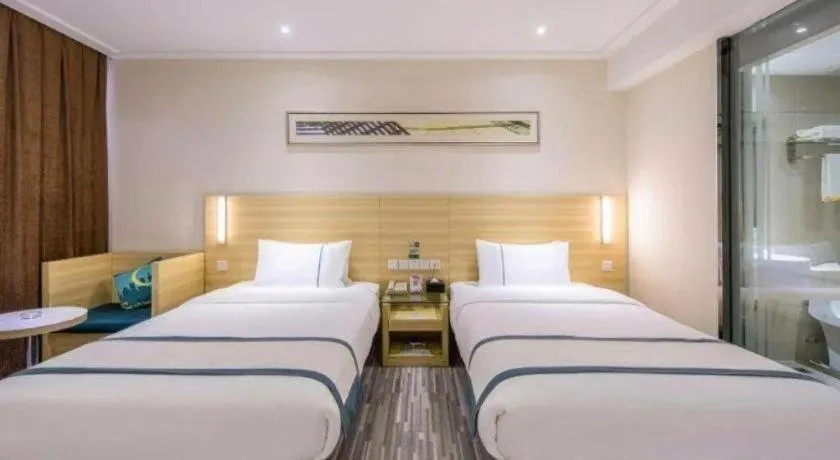 Bed in City Comfort Inn Zhuhai Hengqin Ocean Kingdom Huafa Shangdu