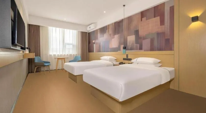 Bed in City Comfort Inn Liuzhou Wuling Liutai Road