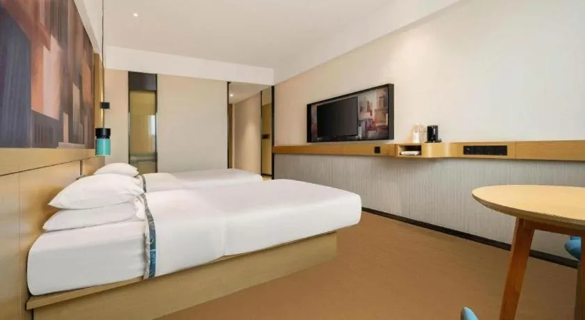 Bed in City Comfort Inn Liuzhou Wuling Liutai Road