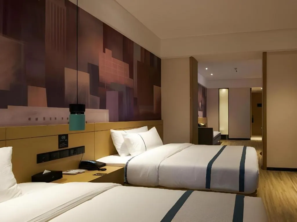 Bed in City Comfort Inn Liuzhou Wuling Liutai Road