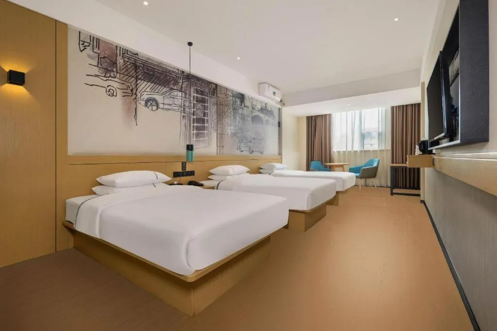 Bed in City Comfort Inn Liuzhou Wuling Liutai Road