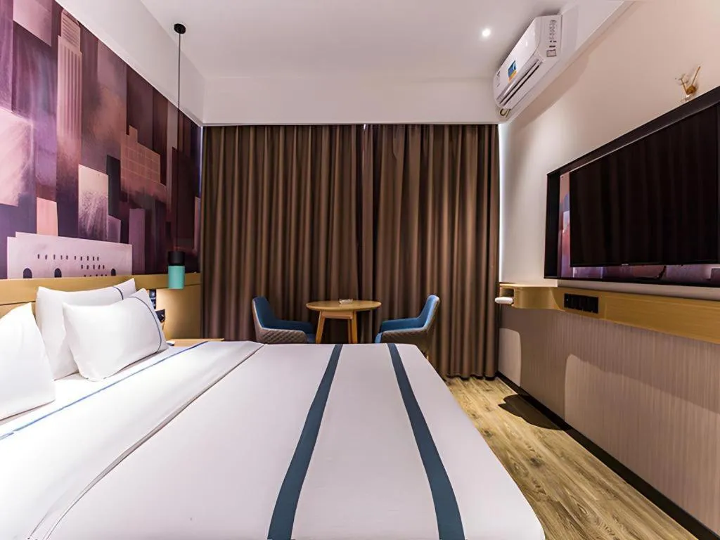 Bed in City Comfort Inn Liuzhou Wuling Liutai Road