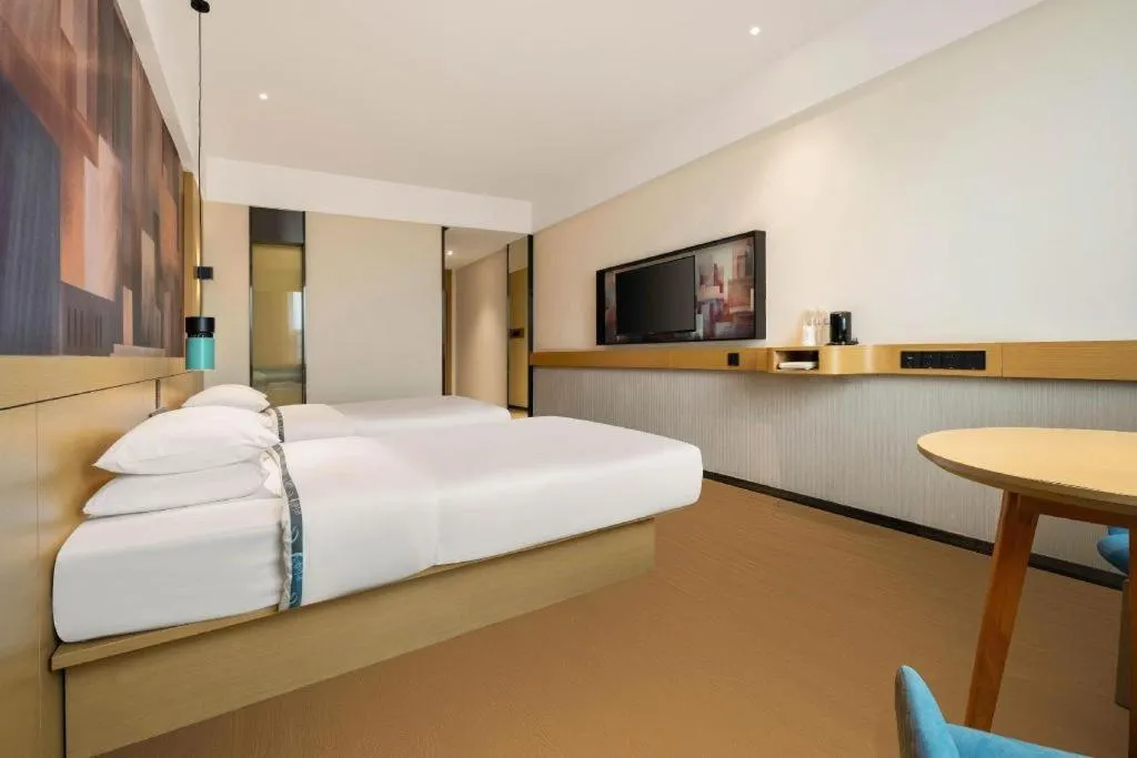 Bed in City Comfort Inn Liuzhou Wuling Liutai Road