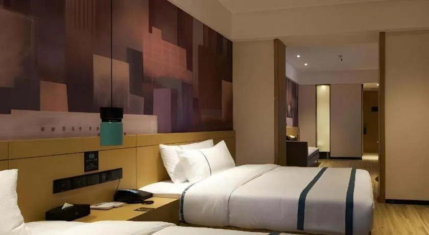 Bed in City Comfort Inn Liuzhou Wuling Liutai Road