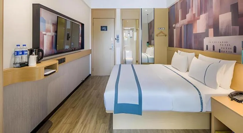 Bed in City Comfort Inn Liuzhou Wuling Liutai Road