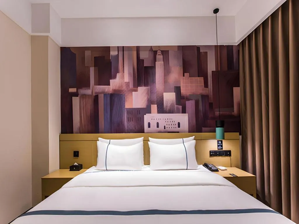 Bed in City Comfort Inn Liuzhou Wuling Liutai Road