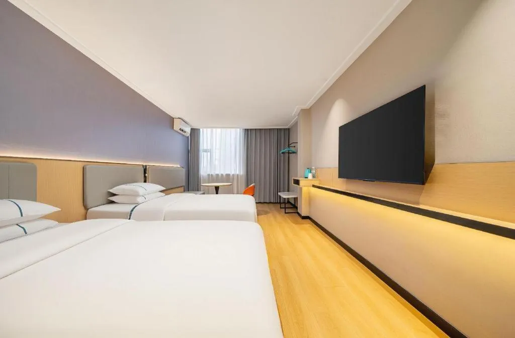 Bed in City Comfort Inn Nanning Wuming Xiangshan Avenue