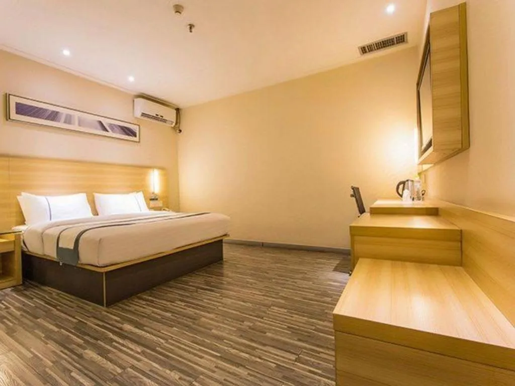 Bed in City Comfort Inn Nanning Wuming Xiangshan Avenue