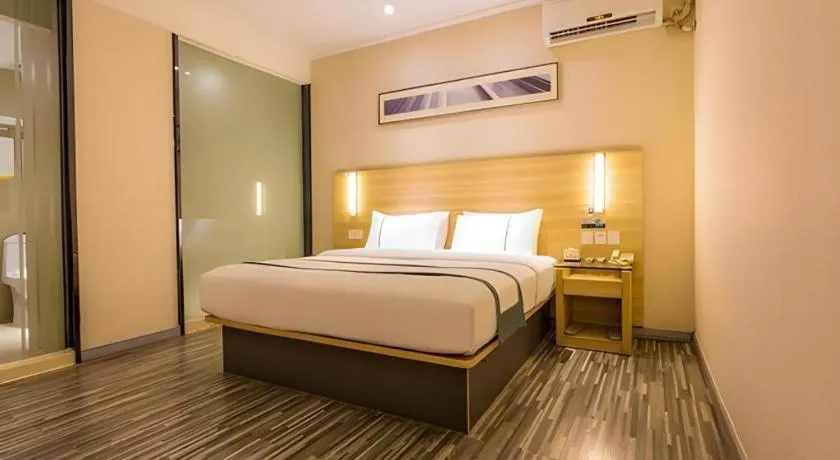 Bed in City Comfort Inn Nanning Wuming Xiangshan Avenue