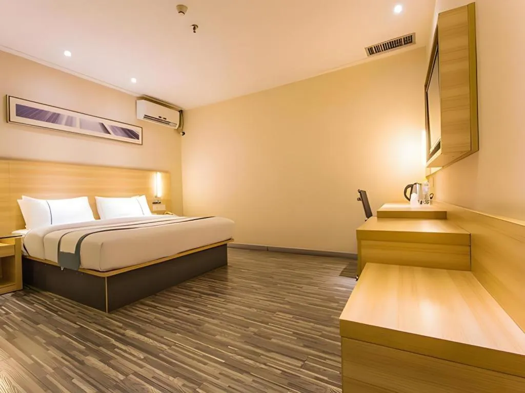 Bed in City Comfort Inn Nanning Wuming Xiangshan Avenue