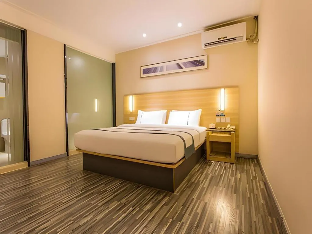 Bed in City Comfort Inn Nanning Wuming Xiangshan Avenue