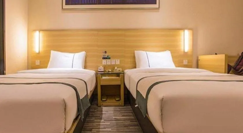 Bed in City Comfort Inn Nanning Wuming Xiangshan Avenue
