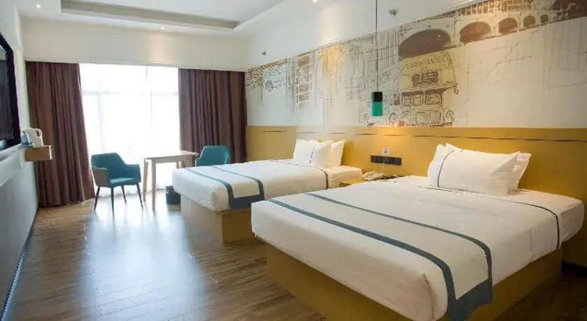 Bed in City Comfort Inn Huizhou Longmen Bed in City Comfort Inn Huizhou Longmen