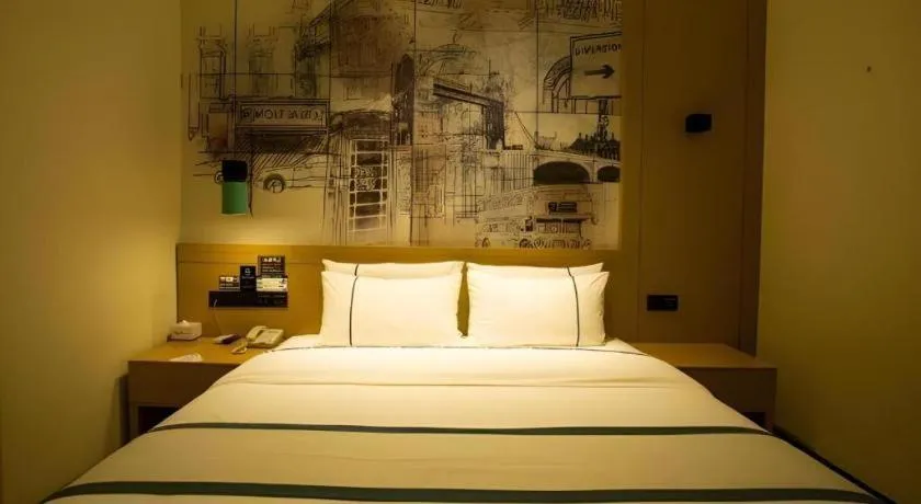 Bed in City Comfort Inn Huanggang Macheng City Mo'ercheng