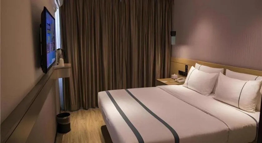 Bed in City Comfort Inn Hainan Tunchang Changsheng Road