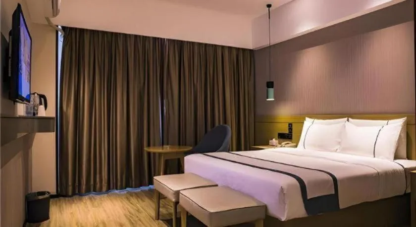 Bed in City Comfort Inn Hainan Tunchang Changsheng Road