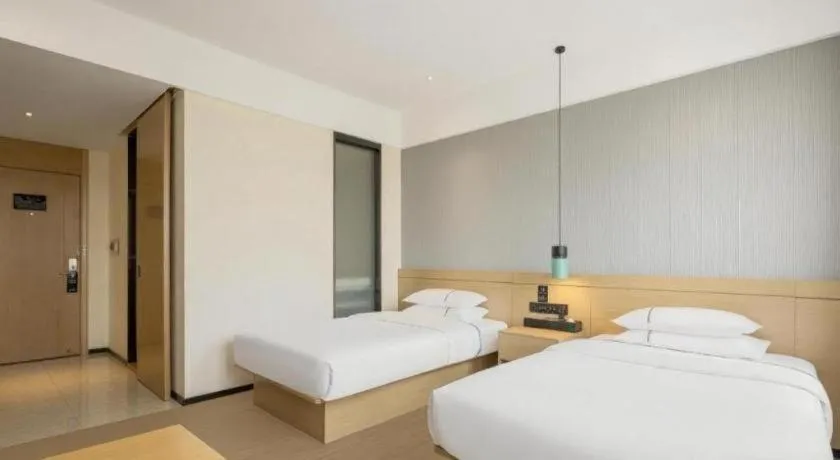 Bed in City Comfort Inn Hainan Tunchang Changsheng Road