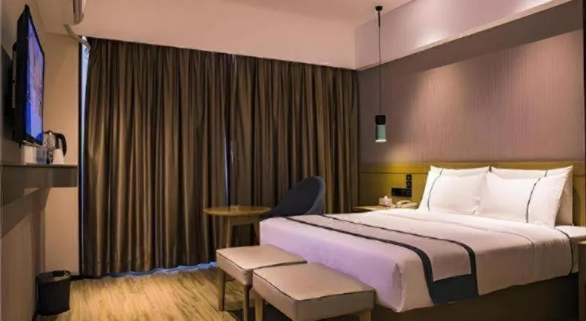 Bed in City Comfort Inn Hainan Tunchang Changsheng Road
