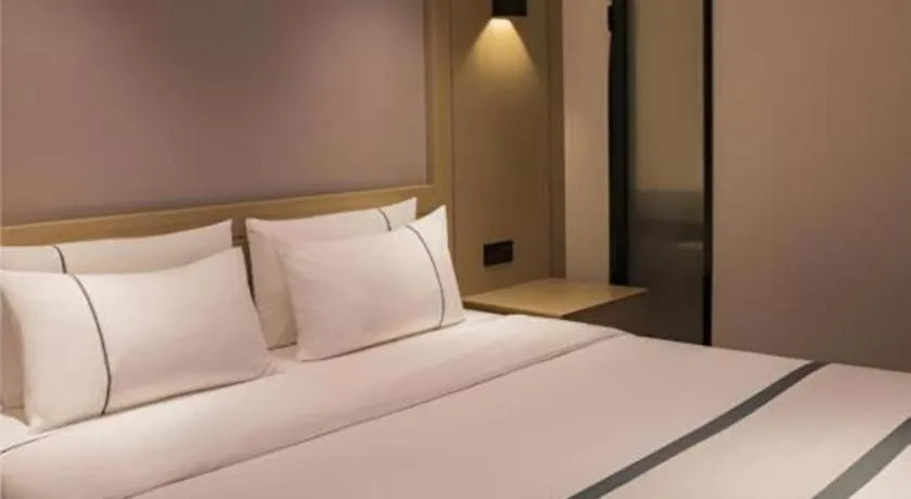 Bed in City Comfort Inn Hainan Tunchang Changsheng Road