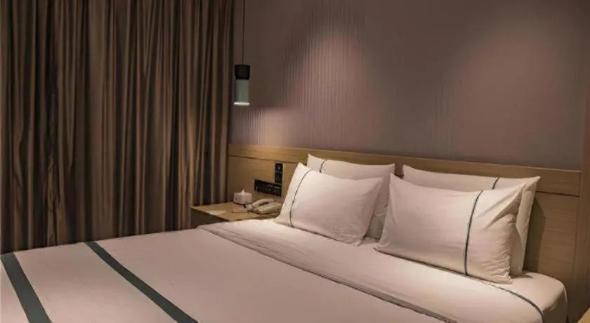 Bed in City Comfort Inn Hainan Tunchang Changsheng Road
