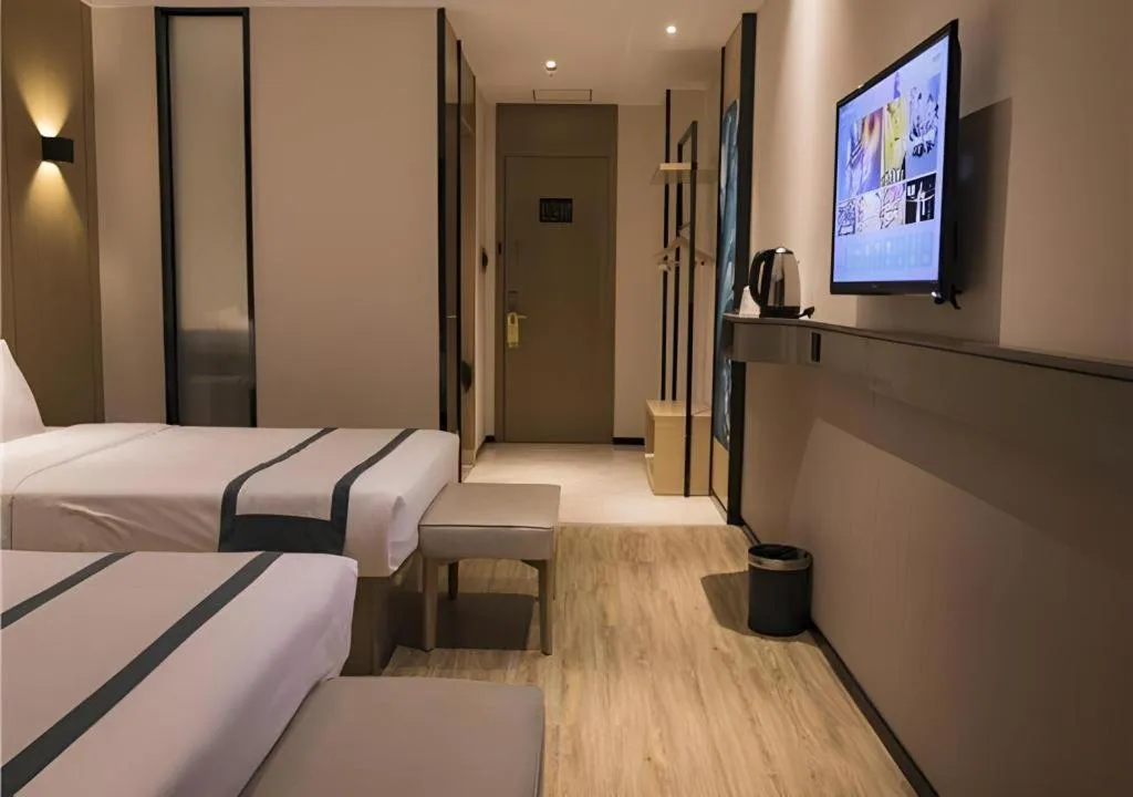 Bed in City Comfort Inn Hainan Tunchang Changsheng Road