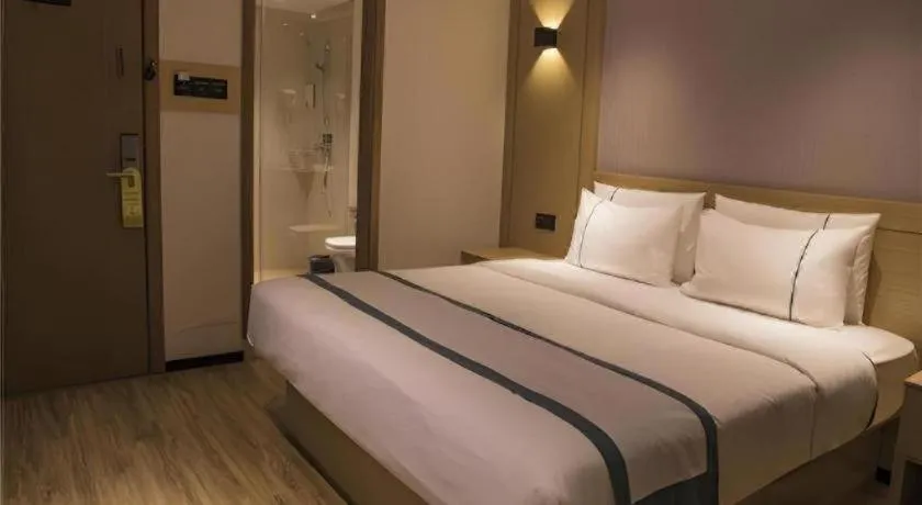 Bed in City Comfort Inn Hainan Tunchang Changsheng Road