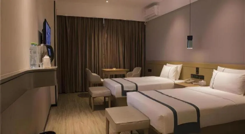 Bed in City Comfort Inn Hainan Tunchang Changsheng Road