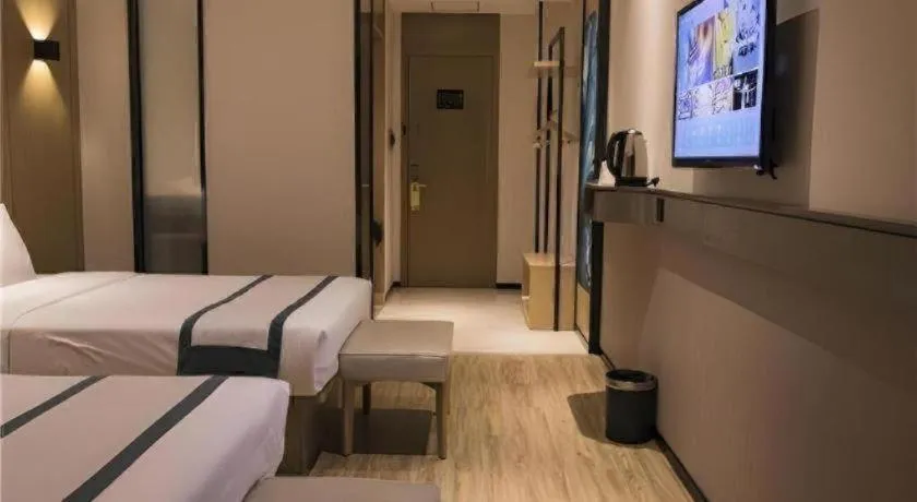 Bed in City Comfort Inn Hainan Tunchang Changsheng Road