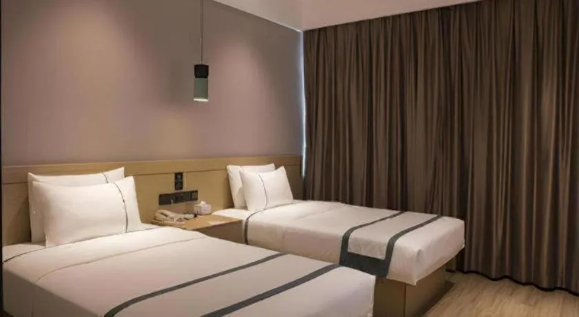 Bed in City Comfort Inn Hainan Tunchang Changsheng Road