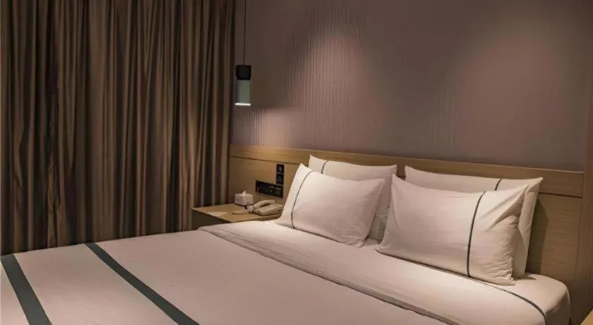 Bed in City Comfort Inn Hainan Tunchang Changsheng Road