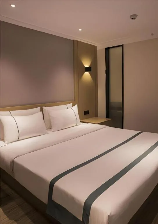 Bed in City Comfort Inn Hainan Tunchang Changsheng Road