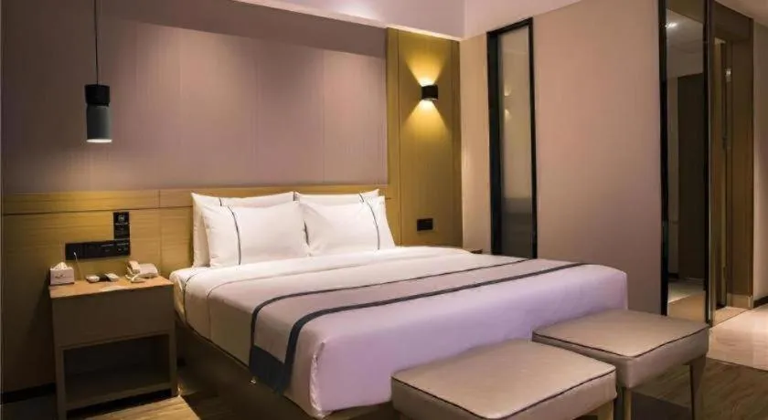 Bed in City Comfort Inn Hainan Tunchang Changsheng Road
