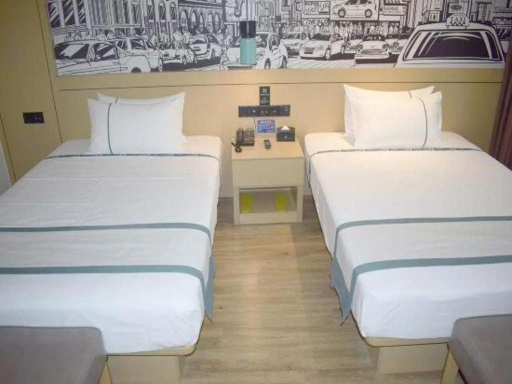 Bed in City Comfort Inn Meishan Wanda Plaza