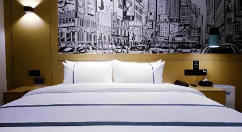 Bed in City Comfort Inn Meishan Wanda Plaza