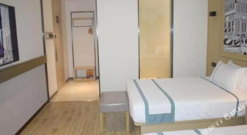 Bed in City Comfort Inn Meishan Wanda Plaza