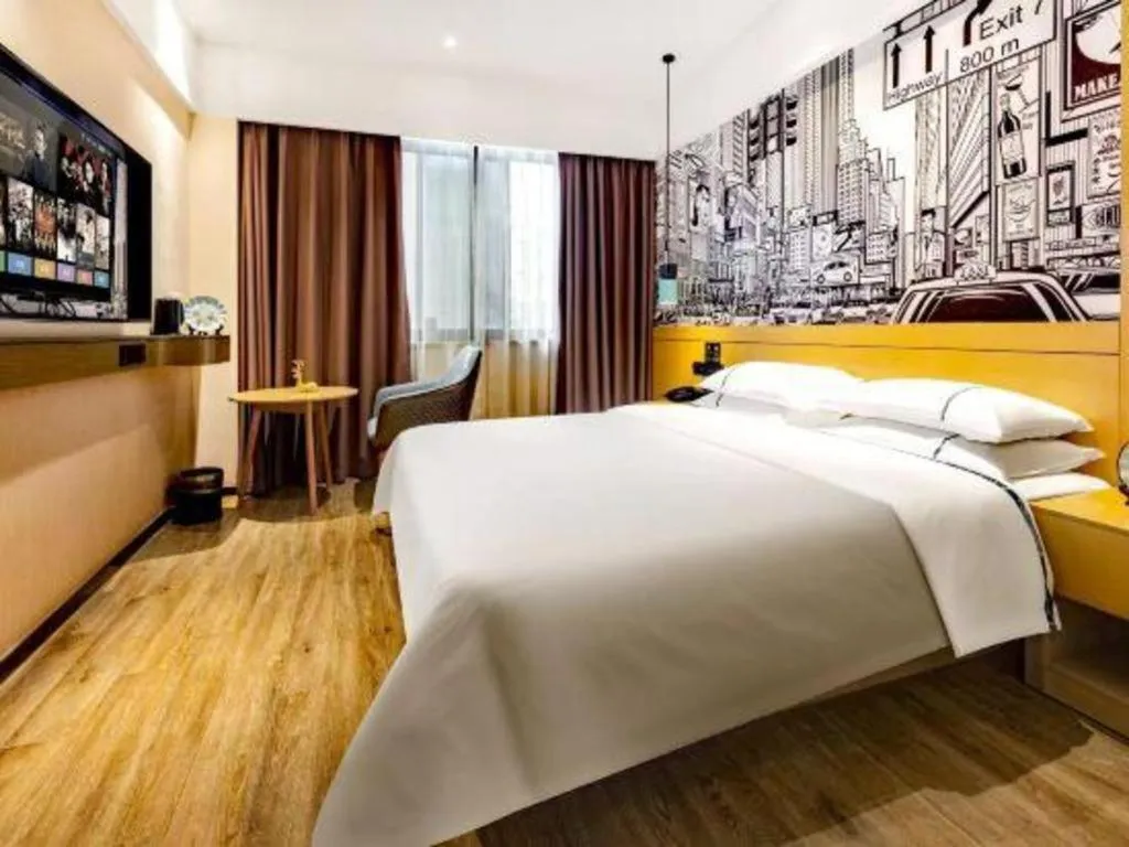 Bed in City Comfort Inn Meishan Wanda Plaza