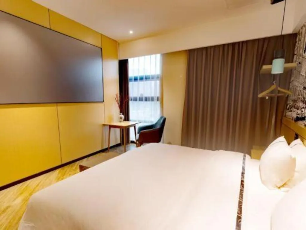 Bed in City Comfort Inn Meishan Wanda Plaza