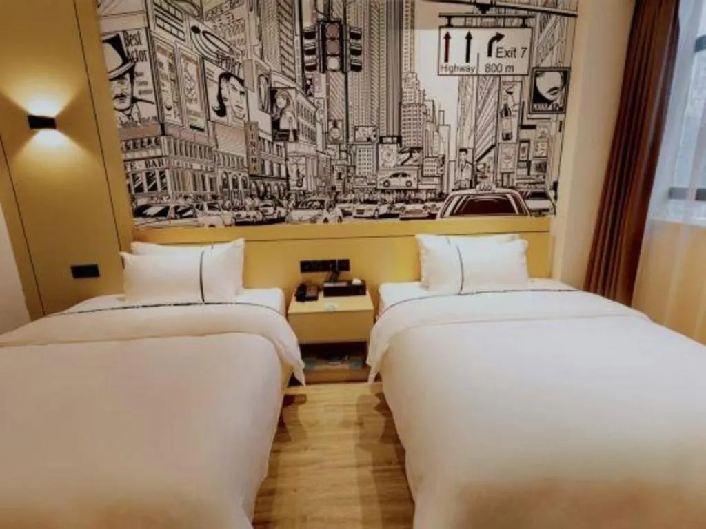 Bed in City Comfort Inn Meishan Wanda Plaza