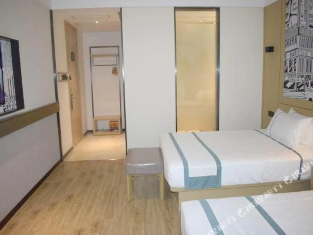 Bed in City Comfort Inn Meishan Wanda Plaza