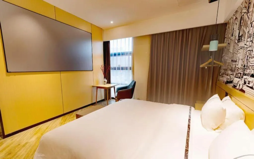 Bed in City Comfort Inn Meishan Wanda Plaza