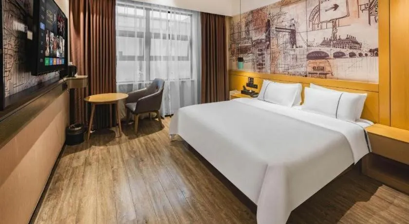 Bed in City Comfort Inn Meishan Wanda Plaza