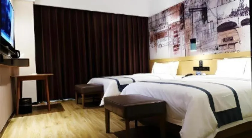 Bed in City Comfort Inn Meishan Wanda Plaza