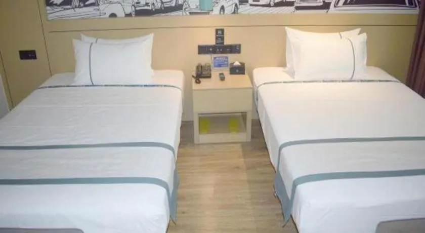 Bed in City Comfort Inn Meishan Wanda Plaza