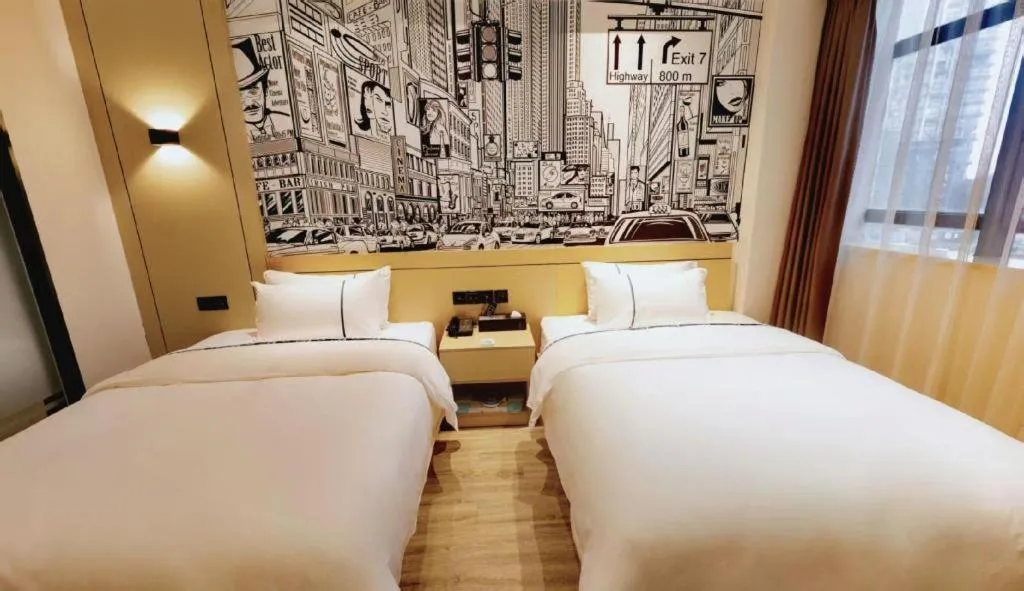 Bed in City Comfort Inn Meishan Wanda Plaza