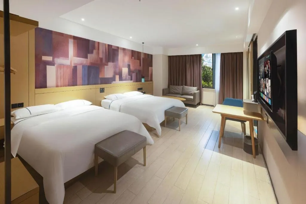 Bed in City Comfort Inn Meishan Wanda Plaza