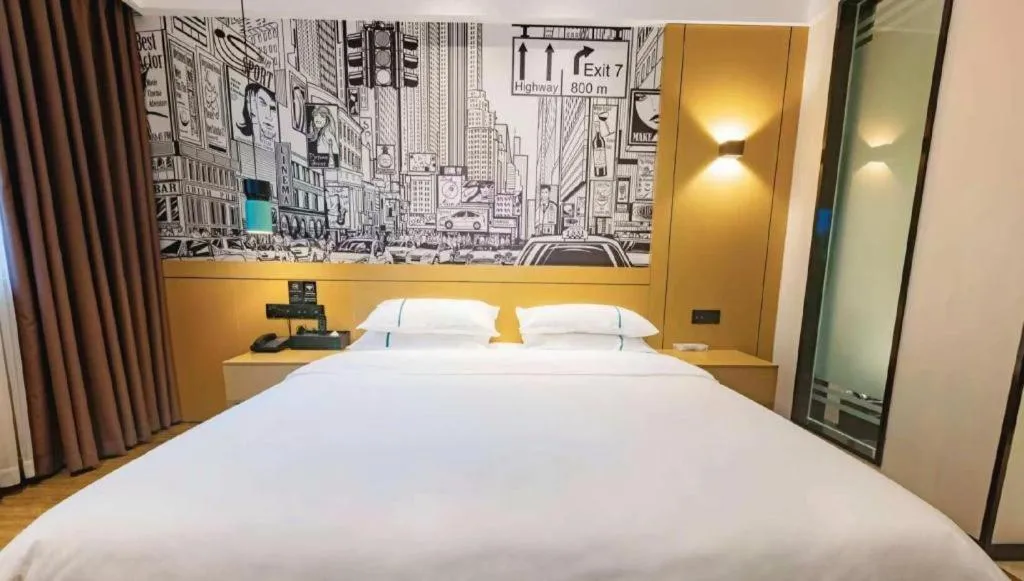 Bed in City Comfort Inn Meishan Wanda Plaza