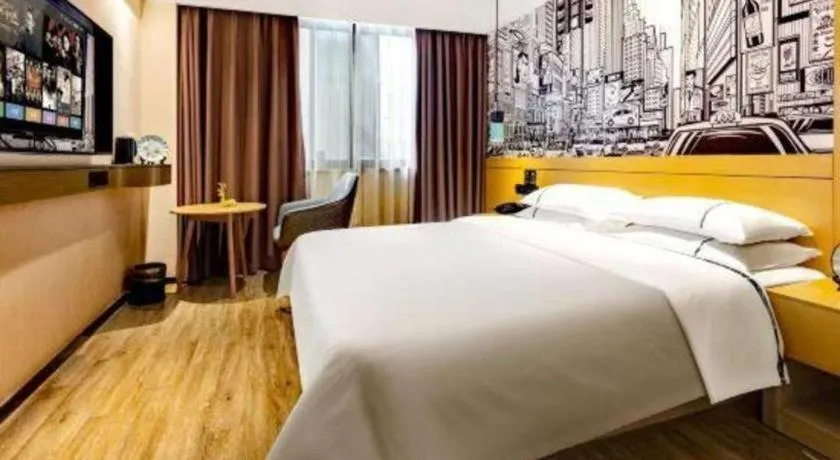 Bed in City Comfort Inn Meishan Wanda Plaza