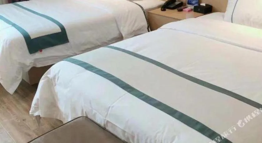 Bed in City Comfort Inn Meishan Wanda Plaza