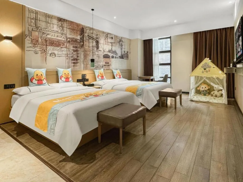 Bed in City Comfort Inn Meishan Wanda Plaza