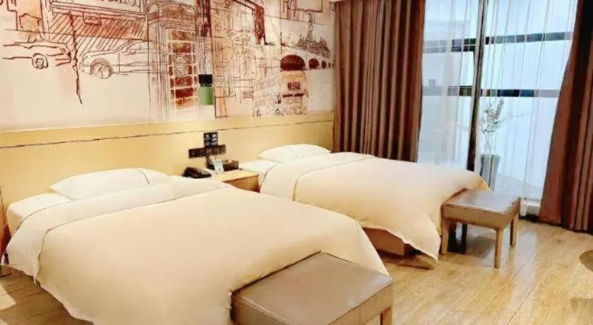 Bed in City Comfort Inn Meishan Wanda Plaza